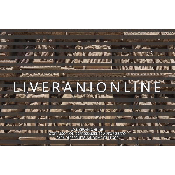 (140309) -- MADHYA PRADESH, March 9, 2014 () -- Photo taken on March 8, 2014 shows the sculptures of a Jain temple at the Khajuraho group of monuments in Madhya Pradesh of India. The Khajuraho group of monuments, or the temples at Khajuraho in Madhya Pradesh of India, were built during the Chandella dynasty, which reached its apogee between 950 and 1050. Only about 20 temples remain; they fall into three distinct groups and belong to two different religions -- Hinduism and Jainism. They strike a perfect balance between architecture and sculpture. The temples at Khajuraho are decorated with a profusion of sculptures showing details of life of ancient people and are among the greatest masterpieces of Indian art. The Khajuraho group of monuments were recognized as the world cultural heritage by the UNESCO in 1986. (/Zheng Huansong) ©photohsot/AGENZIA ALDO LIVERANI SAS - ITALY ONLY - i monumenti, templi di Khajuraho o il Madhya Pradesh appartengono a due diverse religioni - induismo e il giainismo e sono tra i piu\' grandi capolavori dell\'arte indiana, riconosciuti come patrimonio culturale mondiale dall\'UNESCO nel 1986