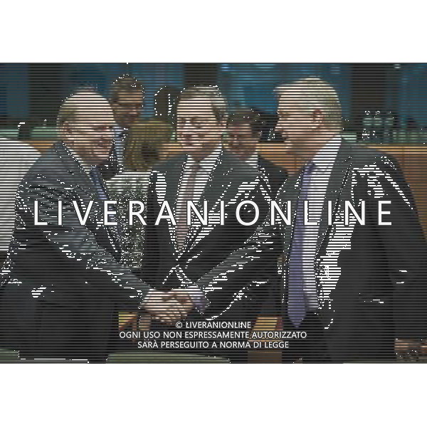 (L-R) Irish Finance Minister Michael Noonan, President of the European Central Bank (ECB) Mario Draghi and Olli Rehn, the European Commissioner in charge of the Monetary Affairs prior to the Eurogroup Finance Ministers meeting at the EU council headquarters in Brussels, Belgium on 10.03.2014 The Eurogroup is to discuss Winter 2014 European economic forecast by the European Commission, European Stability Mechanism (ESM) direct bank recapitalization instrument and economic adjustment programme in Cyprus, Greece and Portugal. by Wiktor Dabkowski AG ALDO LIVERANI SAS ONLY ITALY