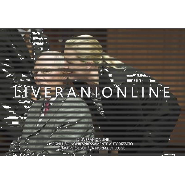 Finnish Finance Minister Jutta Urpilainen and German Finance Minister Wolfgang Schaeuble kiss prior to the Eurogroup Finance Ministers meeting at the EU council headquarters in Brussels, Belgium on 10.03.2014 The Eurogroup is to discuss Winter 2014 European economic forecast by the European Commission, European Stability Mechanism (ESM) direct bank recapitalization instrument and economic adjustment programme in Cyprus, Greece and Portugal. by Wiktor Dabkowski AG ALDO LIVERANI SAS ONLY ITALY