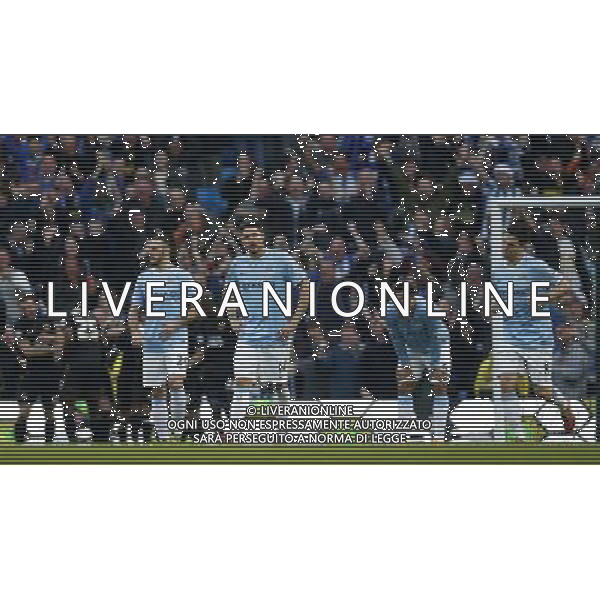 (140310) -- MANCHESTER, March 10, 2014 () -- Martin Demichelis, Javi Garcia, Joleon Lescott and Samir Nasri of Manchester City (From L to R) react as players of Wigan celebrate their second goal during FA Cup quarterfinal match at Etihad Stadium in Manchester, Britain on March 9, 2014. Manchester City lost 1-2. (/Wang Lili) FOR EDITORIAL USE ONLY. NOT FOR SALE FOR MARKETING OR ADVERTISING CAMPAIGNS. NO USE WITH UNAUTHORIZED AUDIO, VIDEO, DATA, FIXTURE LISTS, CLUBLEAGUE LOGOS OR LIVE SERVICES. ONLINE IN-MATCH USE LIMITED TO 45 IMAGES, NO VIDEO EMULATION. NO USE IN BETTING, GAMES OR SINGLE CLUBLEAGUEPLAYER PUBLICATIONS. AG ALDO LIVERANI SAS ONLY ITALY
