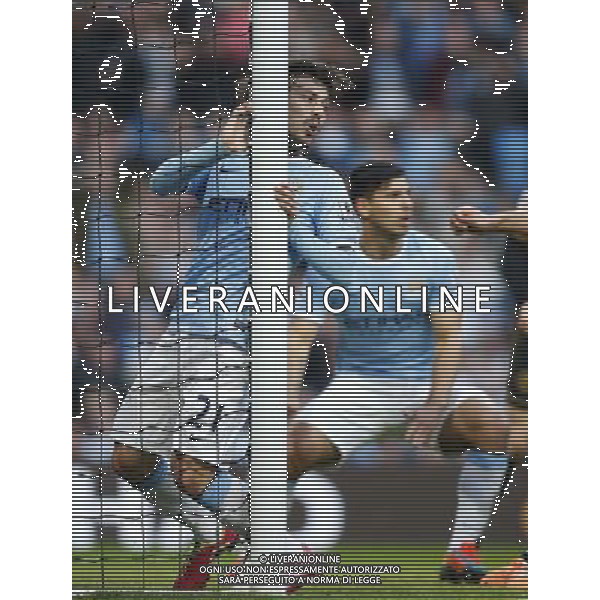 (140310) -- MANCHESTER, March 10, 2014 () -- David Silva (L) of Manchester City reacts after missing a goal during FA Cup quarterfinal match between Manchester City and Wigan at Etihad Stadium in Manchester, Britain on March 9, 2014. Manchester City lost 1-2. (/Wang Lili) FOR EDITORIAL USE ONLY. NOT FOR SALE FOR MARKETING OR ADVERTISING CAMPAIGNS. NO USE WITH UNAUTHORIZED AUDIO, VIDEO, DATA, FIXTURE LISTS, CLUBLEAGUE LOGOS OR LIVE SERVICES. ONLINE IN-MATCH USE LIMITED TO 45 IMAGES, NO VIDEO EMULATION. NO USE IN BETTING, GAMES OR SINGLE CLUBLEAGUEPLAYER PUBLICATIONS. AG ALDO LIVERANI SAS ONLY ITALY