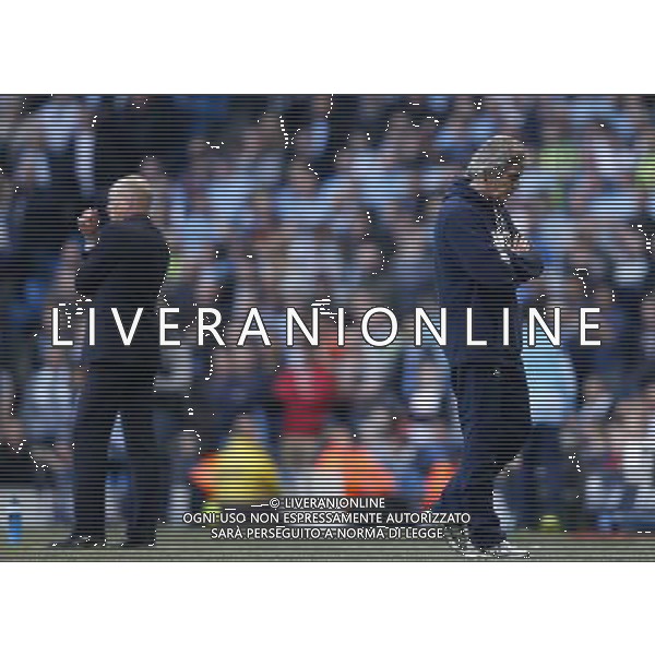 (140310) -- MANCHESTER, March 10, 2014 () -- Manuel Pellegrini (R), manager of Manchester City reacts during FA Cup quarterfinal match between Manchester City and Wigan at Etihad Stadium in Manchester, Britain on March 9, 2014. Manchester City lost 1-2. (/Wang Lili) FOR EDITORIAL USE ONLY. NOT FOR SALE FOR MARKETING OR ADVERTISING CAMPAIGNS. NO USE WITH UNAUTHORIZED AUDIO, VIDEO, DATA, FIXTURE LISTS, CLUBLEAGUE LOGOS OR LIVE SERVICES. ONLINE IN-MATCH USE LIMITED TO 45 IMAGES, NO VIDEO EMULATION. NO USE IN BETTING, GAMES OR SINGLE CLUBLEAGUEPLAYER PUBLICATIONS. AG ALDO LIVERANI SAS ONLY ITALY