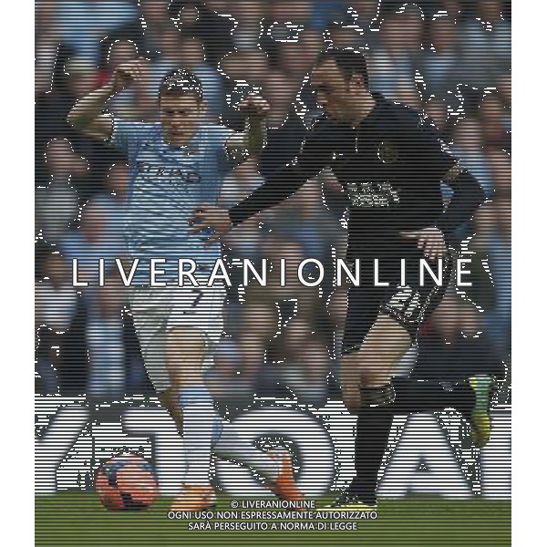 (140310) -- MANCHESTER, March 10, 2014 () -- James Milner (L) of Manchester City vies with Ivan Ramis of Wigan during FA Cup quarterfinal match at Etihad Stadium in Manchester, Britain on March 9, 2014. Manchester City lost 1-2. (/Wang Lili) FOR EDITORIAL USE ONLY. NOT FOR SALE FOR MARKETING OR ADVERTISING CAMPAIGNS. NO USE WITH UNAUTHORIZED AUDIO, VIDEO, DATA, FIXTURE LISTS, CLUBLEAGUE LOGOS OR LIVE SERVICES. ONLINE IN-MATCH USE LIMITED TO 45 IMAGES, NO VIDEO EMULATION. NO USE IN BETTING, GAMES OR SINGLE CLUBLEAGUEPLAYER PUBLICATIONS. AG ALDO LIVERANI SAS ONLY ITALY