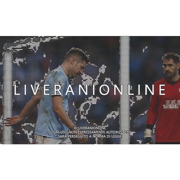 (140310) -- MANCHESTER, March 10, 2014 () -- Javi Garcia (L) of Manchester City reacts after missing a goal during FA Cup quarterfinal match between Manchester City and Wigan at Etihad Stadium in Manchester, Britain on March 9, 2014. Manchester City lost 1-2. (/Wang Lili) FOR EDITORIAL USE ONLY. NOT FOR SALE FOR MARKETING OR ADVERTISING CAMPAIGNS. NO USE WITH UNAUTHORIZED AUDIO, VIDEO, DATA, FIXTURE LISTS, CLUBLEAGUE LOGOS OR LIVE SERVICES. ONLINE IN-MATCH USE LIMITED TO 45 IMAGES, NO VIDEO EMULATION. NO USE IN BETTING, GAMES OR SINGLE CLUBLEAGUEPLAYER PUBLICATIONS. AG ALDO LIVERANI SAS ONLY ITALY