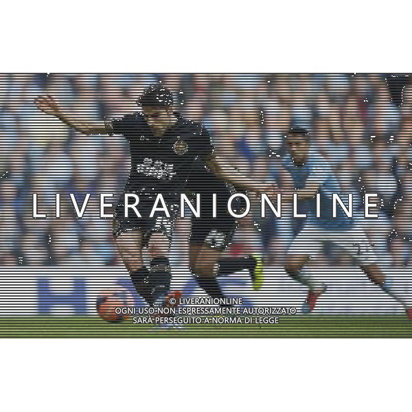 (140310) -- MANCHESTER, March 10, 2014 () -- Jordi Gomez of Wigan scores their team\'s first goal from the penalty spot after FA Cup quarterfinal match between Manchester City and Wigan at Etihad Stadium in Manchester, Britain on March 9, 2014. Wigan won 2-1. (/Wang Lili) FOR EDITORIAL USE ONLY. NOT FOR SALE FOR MARKETING OR ADVERTISING CAMPAIGNS. NO USE WITH UNAUTHORIZED AUDIO, VIDEO, DATA, FIXTURE LISTS, CLUBLEAGUE LOGOS OR LIVE SERVICES. ONLINE IN-MATCH USE LIMITED TO 45 IMAGES, NO VIDEO EMULATION. NO USE IN BETTING, GAMES OR SINGLE CLUBLEAGUEPLAYER PUBLICATIONS. AG ALDO LIVERANI SAS ONLY ITALY