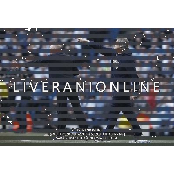 (140310) -- MANCHESTER, March 10, 2014 () -- Manuel Pellegrini (R), manager of Manchester City gives instructions during FA Cup quarterfinal match between Manchester City and Wigan at Etihad Stadium in Manchester, Britain on March 9, 2014. Manchester City lost 1-2. (/Wang Lili) FOR EDITORIAL USE ONLY. NOT FOR SALE FOR MARKETING OR ADVERTISING CAMPAIGNS. NO USE WITH UNAUTHORIZED AUDIO, VIDEO, DATA, FIXTURE LISTS, CLUBLEAGUE LOGOS OR LIVE SERVICES. ONLINE IN-MATCH USE LIMITED TO 45 IMAGES, NO VIDEO EMULATION. NO USE IN BETTING, GAMES OR SINGLE CLUBLEAGUEPLAYER PUBLICATIONS. AG ALDO LIVERANI SAS ONLY ITALY