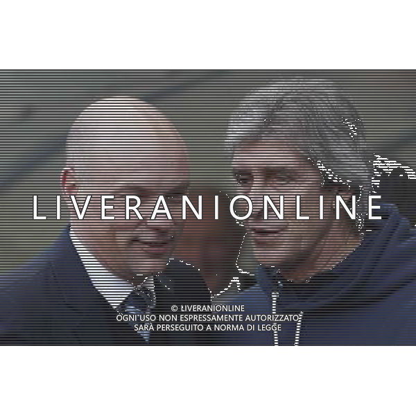 (140310) -- MANCHESTER, March 10, 2014 () -- Manuel Pellegrini (R), manager of Manchester City, talks to Wigan Athletic\'s manager Uwe Rosler ahead of FA Cup quarterfinal match at Etihad Stadium in Manchester, Britain on March 9, 2014. Manchester City lost 1-2. (/Wang Lili) FOR EDITORIAL USE ONLY. NOT FOR SALE FOR MARKETING OR ADVERTISING CAMPAIGNS. NO USE WITH UNAUTHORIZED AUDIO, VIDEO, DATA, FIXTURE LISTS, CLUBLEAGUE LOGOS OR LIVE SERVICES. ONLINE IN-MATCH USE LIMITED TO 45 IMAGES, NO VIDEO EMULATION. NO USE IN BETTING, GAMES OR SINGLE CLUBLEAGUEPLAYER PUBLICATIONS. AG ALDO LIVERANI SAS ONLY ITALY