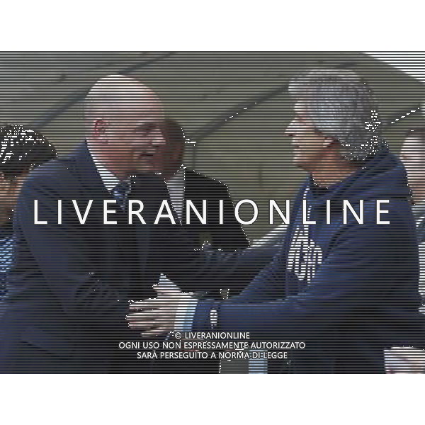 (140310) -- MANCHESTER, March 10, 2014 () -- Uwe Rosler (L), manager of Wigan greets Manuel Pellegrini, manager of Manchester City ahead of FA Cup quarterfinal match between Manchester City and Wigan at Etihad Stadium in Manchester, Britain on March 9, 2014. Wigan won 2-1. (/Wang Lili) FOR EDITORIAL USE ONLY. NOT FOR SALE FOR MARKETING OR ADVERTISING CAMPAIGNS. NO USE WITH UNAUTHORIZED AUDIO, VIDEO, DATA, FIXTURE LISTS, CLUBLEAGUE LOGOS OR LIVE SERVICES. ONLINE IN-MATCH USE LIMITED TO 45 IMAGES, NO VIDEO EMULATION. NO USE IN BETTING, GAMES OR SINGLE CLUBLEAGUEPLAYER PUBLICATIONS. AG ALDO LIVERANI SAS ONLY ITALY