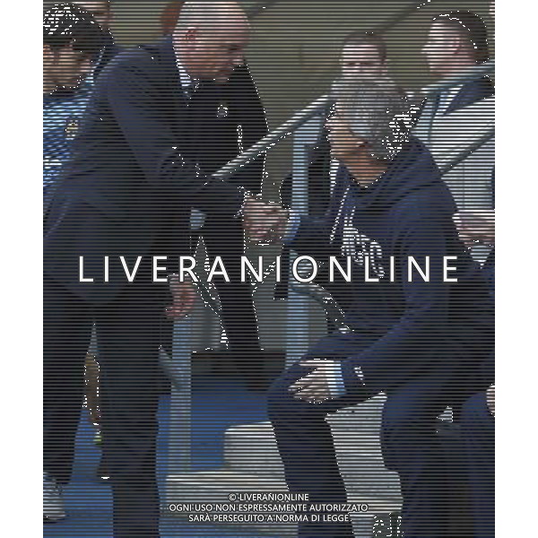 (140310) -- MANCHESTER, March 10, 2014 () -- Uwe Rosler (L), manager of Wigan greets Manuel Pellegrini, manager of Manchester City ahead of FA Cup quarterfinal match between Manchester City and Wigan at Etihad Stadium in Manchester, Britain on March 9, 2014. Wigan won 2-1. (/Wang Lili) FOR EDITORIAL USE ONLY. NOT FOR SALE FOR MARKETING OR ADVERTISING CAMPAIGNS. NO USE WITH UNAUTHORIZED AUDIO, VIDEO, DATA, FIXTURE LISTS, CLUBLEAGUE LOGOS OR LIVE SERVICES. ONLINE IN-MATCH USE LIMITED TO 45 IMAGES, NO VIDEO EMULATION. NO USE IN BETTING, GAMES OR SINGLE CLUBLEAGUEPLAYER PUBLICATIONS. AG ALDO LIVERANI SAS ONLY ITALY