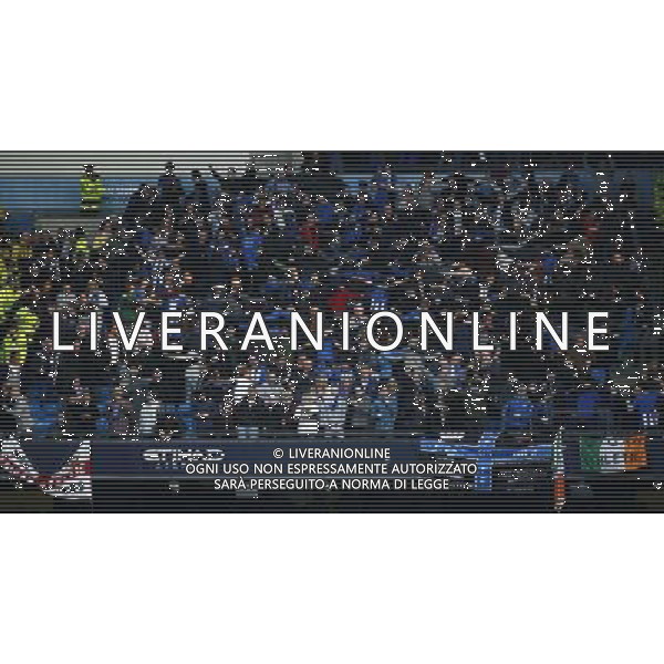 (140310) -- MANCHESTER, March 10, 2014 () -- Supporters of Wigan celebrate James Perch scoring their team\'s second goal during FA Cup quarterfinal match between Manchester City and Wigan at Etihad Stadium in Manchester, Britain on March 9, 2014. Wigan won 2-1. (/Wang Lili) FOR EDITORIAL USE ONLY. NOT FOR SALE FOR MARKETING OR ADVERTISING CAMPAIGNS. NO USE WITH UNAUTHORIZED AUDIO, VIDEO, DATA, FIXTURE LISTS, CLUBLEAGUE LOGOS OR LIVE SERVICES. ONLINE IN-MATCH USE LIMITED TO 45 IMAGES, NO VIDEO EMULATION. NO USE IN BETTING, GAMES OR SINGLE CLUBLEAGUEPLAYER PUBLICATIONS. AG ALDO LIVERANI SAS ONLY ITALY