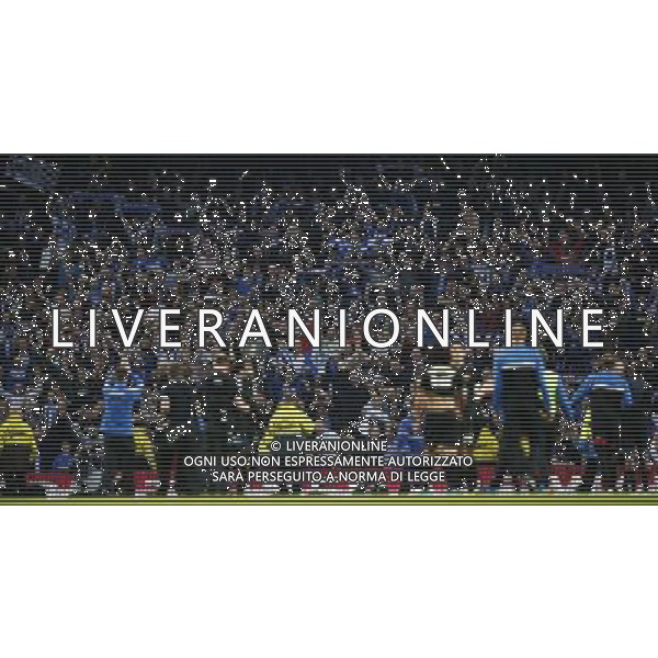 (140310) -- MANCHESTER, March 10, 2014 () -- Supporters of Wigan celebrate victory after FA Cup quarterfinal match between Manchester City and Wigan at Etihad Stadium in Manchester, Britain on March 9, 2014. Wigan won 2-1. (/Wang Lili) FOR EDITORIAL USE ONLY. NOT FOR SALE FOR MARKETING OR ADVERTISING CAMPAIGNS. NO USE WITH UNAUTHORIZED AUDIO, VIDEO, DATA, FIXTURE LISTS, CLUBLEAGUE LOGOS OR LIVE SERVICES. ONLINE IN-MATCH USE LIMITED TO 45 IMAGES, NO VIDEO EMULATION. NO USE IN BETTING, GAMES OR SINGLE CLUBLEAGUEPLAYER PUBLICATIONS. AG ALDO LIVERANI SAS ONLY ITALY