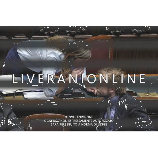 Roma - 11/03/2014 - Montecitorio - Discussione della nuova legge elettorale Italicum - nella foto: Francesco Paolo Sisto e Maria Elena Boschi /Ph. Fabrizio Corradetti - Ag. Aldo Liverani sas