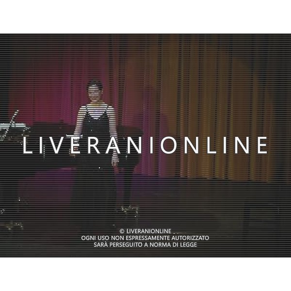 (140309) -- FRANKFURT, March 9, 2014 () -- German alto Ruth Zetzsche performs in a concert at the International Theater in Frankfurt, Germany, on March 9, 2014. Ruth Zetzsche invited the audience to revel in love songs and ballads in her concert on Sunday evening. Ruth Zetzsche was born in a musical family in Leipzig of Germany and is recognised for her creativity and unique expression with her own musical style. (/Luo Huanhuan) AG ALDO LIVERANI SAS ONLY ITALY