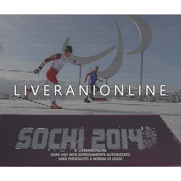 (140310) -- SOCHI, March. 10, 2014 () -- Nitta Yoshihiro (L) of Japan competes during the men\'s 20km standing of Cross Country at the 2014 Sochi Winter Paralympic Games in Sochi, Russia, March 10, 2014. (/Dai Tianfang) AG ALDO LIVERANI SAS ONLY ITALY