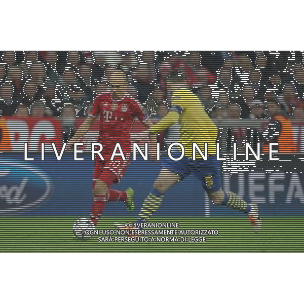 l-r: im Zweikampf, Aktion, mit Arjen Robben #10 (FC Bayern Muenchen), Thomas VERMAELEN #5 (FC Arsenal London) during the UEFA Champions League Round of 16, 2nd Leg match between FC Bayern Munich and Arsenal FC at the Allianz Arena in Muenchen, Germany on 2014/03/11. EXPA Pictures © 2014, PhotoCredit: EXPA/ Eibner-Pressefoto/ Kolbert *****ATTENTION - OUT of GER***** ©photoshot/AGENZIA ALDO LIVERANI SAS - ITALY ONLY - Bayern Monaco vs Arsenal UEFA Champions League Ottavi di 16 all\'Allianz Arena di Monaco di Baviera, in Germania 11 marzo 2014