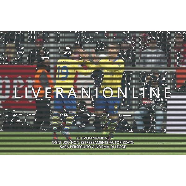 l-r: Torjubel von Santi CAZORLA #19 (FC Arsenal London), Lukas PODOLSKI #9 (FC Arsenal London) during the UEFA Champions League Round of 16, 2nd Leg match between FC Bayern Munich and Arsenal FC at the Allianz Arena in Muenchen, Germany on 2014/03/11. EXPA Pictures © 2014, PhotoCredit: EXPA/ Eibner-Pressefoto/ Kolbert *****ATTENTION - OUT of GER***** ©photoshot/AGENZIA ALDO LIVERANI SAS - ITALY ONLY - Bayern Monaco vs Arsenal UEFA Champions League Ottavi di 16 all\'Allianz Arena di Monaco di Baviera, in Germania 11 marzo 2014