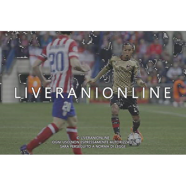 11.03.2014, Estadio Vicente Calderon, Madrid, ESP, UEFA CL, Atletico Madrid vs AC Milan, Achtelfinale, Rueckspiel, im Bild MilanÇs Urby Emanuelson // MilanÇs Urby Emanuelson during the UEFA Champions League Round of 16, 2nd Leg match between Club Atletico de Madrid and AC Milan at the Estadio Vicente Calderon in Madrid, Spain on 2014/03/12. EXPA Pictures © 2014, PhotoCredit: EXPA/ Alterphotos/ Victor Blanco *****ATTENTION - OUT of ESP, SUI***** ©PHOTOSHOT/AGENZIA ALDO LIVERANI SAS - ITALY ONLY - EDITORIAL USE ONLY ©PHOTOSHOT/AGENZIA ALDO LIVERANI SAS - ITALY ONLY - EDITORIAL USE ONLY