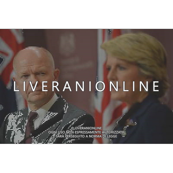 British Foreign Secretary William Hague (L) looks on as Australian Foreign Minister Julie Bishop (R) speaks during a press conference at the Foreign and Commonwealth Office in central London on March 11, 2014. The Australian defence and foreign ministers were in London for the 6th Australia-UK Ministerial meeting (AUKMIN) on foreign, defence and security policy. Earlier in the day on March 11 the visitors joined their British counterparts in a ceremony at the Australian War Memorial to commemorate the service of Australian troops during Word War I.