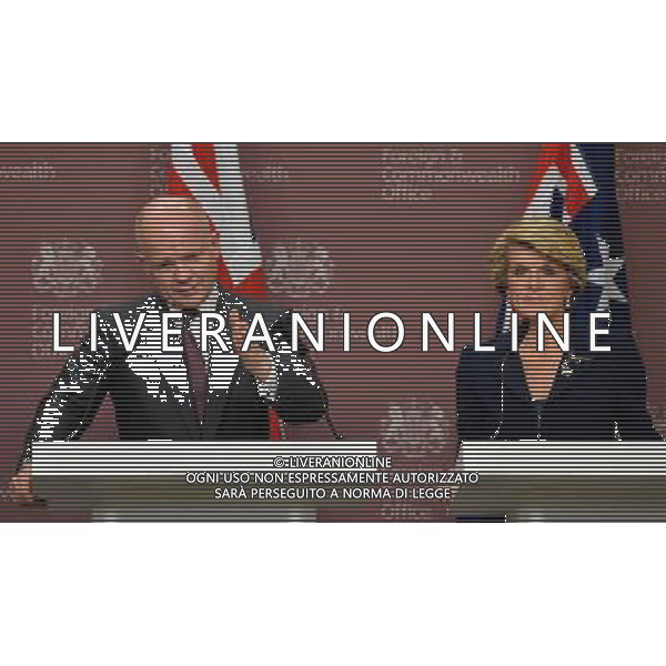 British Foreign Secretary William Hague (L) speaks as Australian Foreign Minister Julie Bishop (R) looks on during a press conference at the Foreign and Commonwealth Office in central London on March 11, 2014. The Australian defence and foreign ministers were in London for the 6th Australia-UK Ministerial meeting (AUKMIN) on foreign, defence and security policy. Earlier in the day on March 11 the visitors joined their British counterparts in a ceremony at the Australian War Memorial to commemorate the service of Australian troops during Word War I.