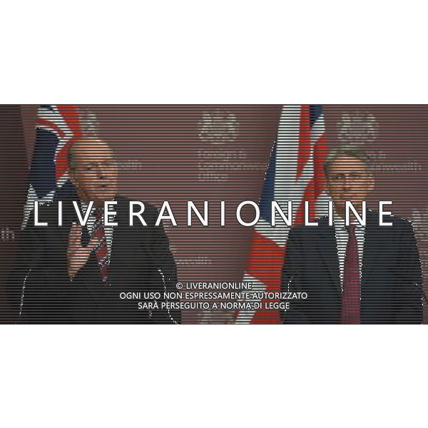 British Defence Secretary Philip Hammond (R) looks on as Australian Defence Minister David Johnston (L) speaks during a press conference at the Foreign and Commonwealth Office in central London on March 11, 2014. The Australian defence and foreign ministers were in London for the 6th Australia-UK Ministerial meeting (AUKMIN) on foreign, defence and security policy. Earlier in the day on March 11 the visitors joined their British counterparts in a ceremony at the Australian War Memorial to commemorate the service of Australian troops during Word War I.