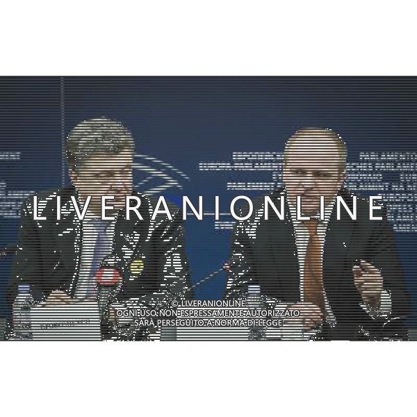 Petro Oleksiyovych Poroshenko Member of the Parliament of Ukraine and one of the Ukrainian opposition leaders (L) and Meber of European Parliament Chair of the Delegation to the EU-Ukraine Parliamentary Cooperation Committee Pawel Kowal during press conference on The situation in Ukraine at European Parliament headquarters in Strasbourg, France on 12.03.2014 AG ALDO LIVERANI SAS ONLY ITALY