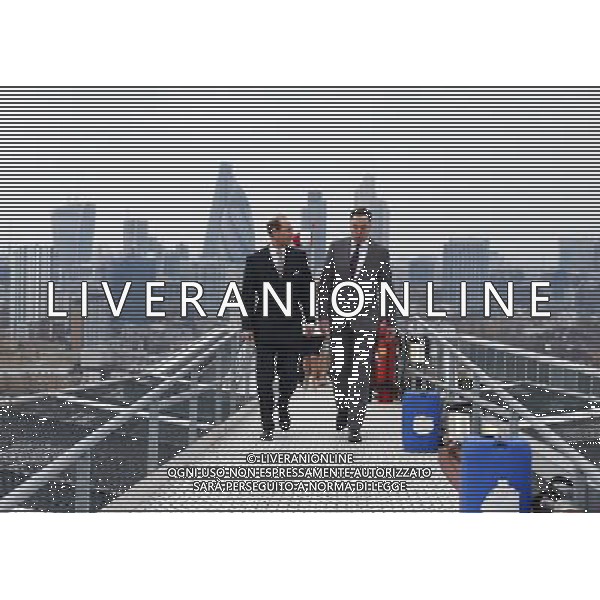 Britain\'s Prince Edward (L) walks onto the helipad with Graham Hodgkin, the Chief Executive of London\'s Air Ambulance at the Royal Hospital in east London March 10, 2014. Prince Edward celebrated his 50th birthday on Monday by visiting the headquarters of London\'s Air Ambulance. ©PHOTOSHOT/AGENZIA ALDO LIVERANI SAS - ITALY ONLY - REALI INGLESI: Il principe Edward esua moglie Sophie, contessa di Wessex presso il Royal Hospital nella zona est di Londra