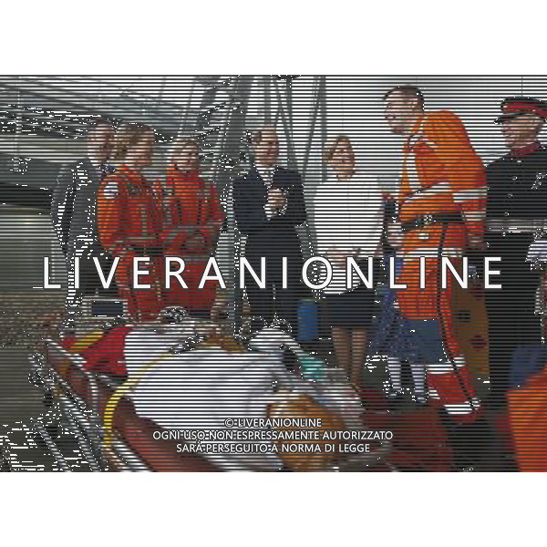 Britain\'s Prince Edward, his wife Sophie, Countess of Wessex chat with the crew of London\'s Air Ambulance after they demonstrated the treatment of a burns victim, under the helipad at the Royal Hospital in east London March 10, 2014. Prince Edward celebrated his 50th birthday on Monday by visiting the headquarters of London\'s Air Ambulance. ©PHOTOSHOT/AGENZIA ALDO LIVERANI SAS - ITALY ONLY - REALI INGLESI: Il principe Edward esua moglie Sophie, contessa di Wessex presso il Royal Hospital nella zona est di Londra