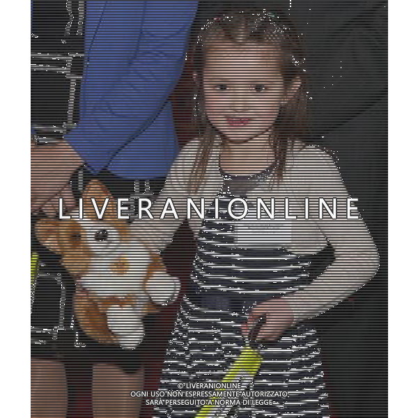 LONDON, ENGLAND - MARCH 11: Camilla, Duchess of Cornwall presents 6 year old Cerys Davies (who has type 1 diabetes) with a toy corgi at a Medical Detection Dog Reception at St James\'s Palace on March 11, 2014 in London, England. ©photoshot/AGENZIA ALDO LIVERANI SAS - ITALY ONLY - REALI INGLESI: Il Principe Carlo e Camilla Duchessa di Cornovaglia durante una dimostrazione di cani rilevazione mediche a Palazzo San Giacomo il 11 Marzo 2014 a Londra, Inghilterra. 