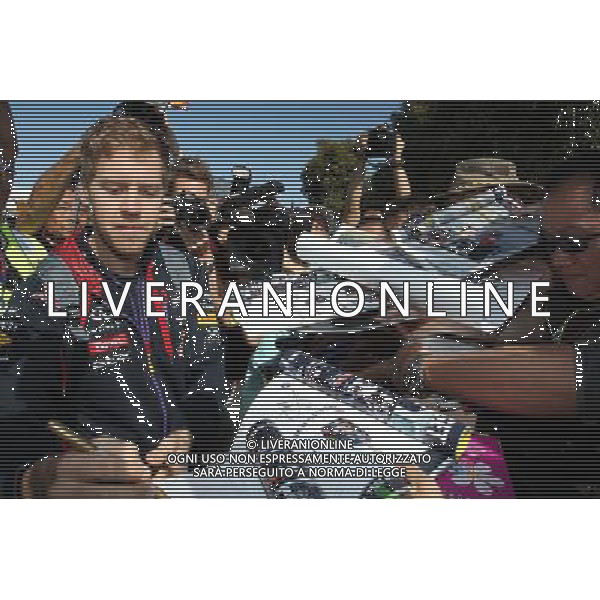 Sebastian Vettel (GER) Red Bull Racing signs autographs for the fans. 14.03.2014. Formula 1 World Championship, Rd 1, Australian Grand Prix, Albert Park, Melbourne, Australia, Practice Day. - www.xpbimages.com, EMail: requests@xpbimages.com - copy of publication required for printed pictures. Every used picture is fee-liable. © Copyright: Moy / XPB Images /Ag. Aldo Liverani s.a.s.-Only Italy-Editorial Use Only