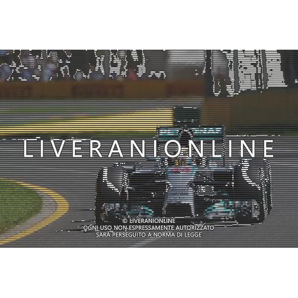 Lewis Hamilton (GBR) Mercedes AMG F1 W05. 14.03.2014. Formula 1 World Championship, Rd 1, Australian Grand Prix, Albert Park, Melbourne, Australia, Practice Day. - www.xpbimages.com, EMail: requests@xpbimages.com - copy of publication required for printed pictures. Every used picture is fee-liable. © Copyright: Photo4 / XPB Images /Ag. Aldo Liverani s.a.s.-Only Italy-Editorial Use Only