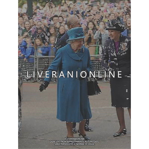  HRH the Queen and the Duke of Edinburgh visit the Royal Holloway University but she has to open and close her own door of the car!! Friday March 14, 2014. ©photoshot/AGENZIA ALDO LIVERANI SAS - ITALY ONLY - REALI INGLESI: la Regina Elisabetta II, in visita alla Royal Holloway, University di Londra