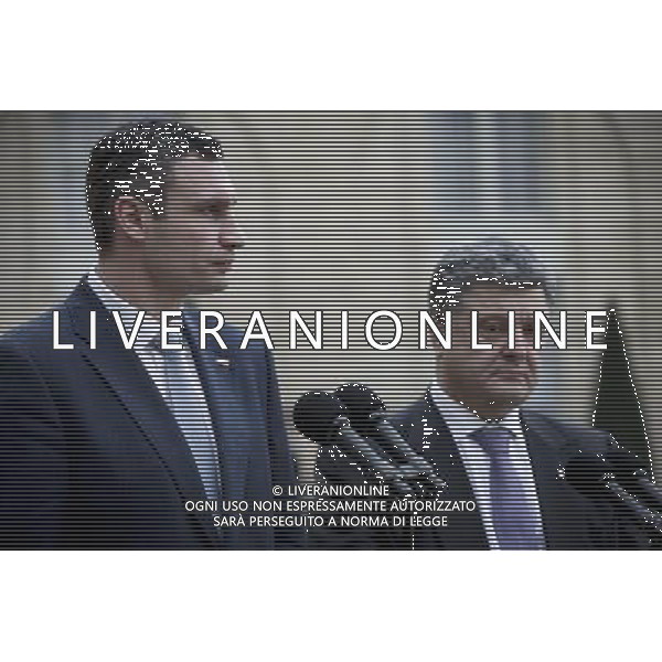 (140308) -- PARIS, March 8, 2014 () -- Ukrainian opposition leader and former world boxing champion Vitali Klitschko(L) and former Ukrainian Foreign Affairs Minister Petro Porochenko speak to media prior to a meeting with French President Francois Hollande at the Elysee Palace in Paris, France, on March 7, 2014. The meeting took place after an extraordinary EU leaders meeting in Brussels regarding the situation in Ukraine. (/Etienne Laurent) ©PHOTOSHOT/AGENZIA ALDO LIVERANI SAS - ITALY ONLY - EDITORIAL USE ONLY