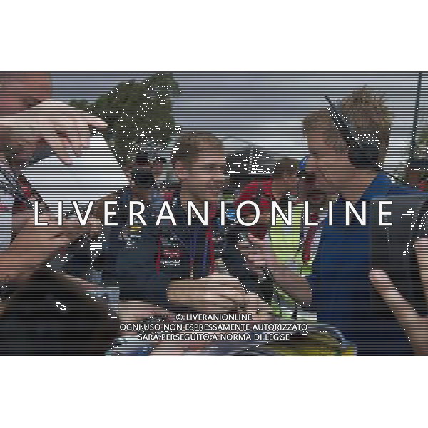 (140315) -- MELBOURNE, March 15, 2014 () -- Red Bull driver Sebastian Vettel of Germany signs autographs ahead of the qualifying session for the Australian Formula One Grand Prix in Melbourne, Australia, March 15, 2014. (/Bai Xue) AG ALDO LIVERANI SAS ONLY ITALY