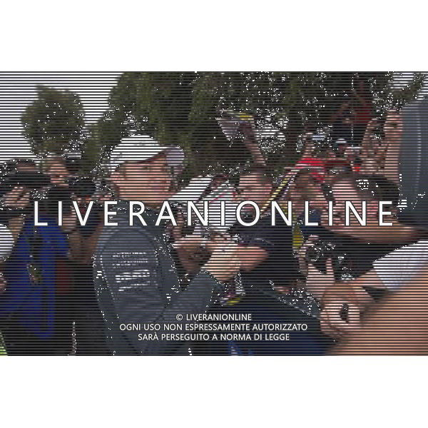 (140315) -- MELBOURNE, March 15, 2014 () -- Mercedes Formula One driver Nico Rosberg of Germany signs autographs ahead of the qualifying session for the Australian Formula One Grand Prix in Melbourne, Australia, March 15, 2014. (/Bai Xue) AG ALDO LIVERANI SAS ONLY ITALY