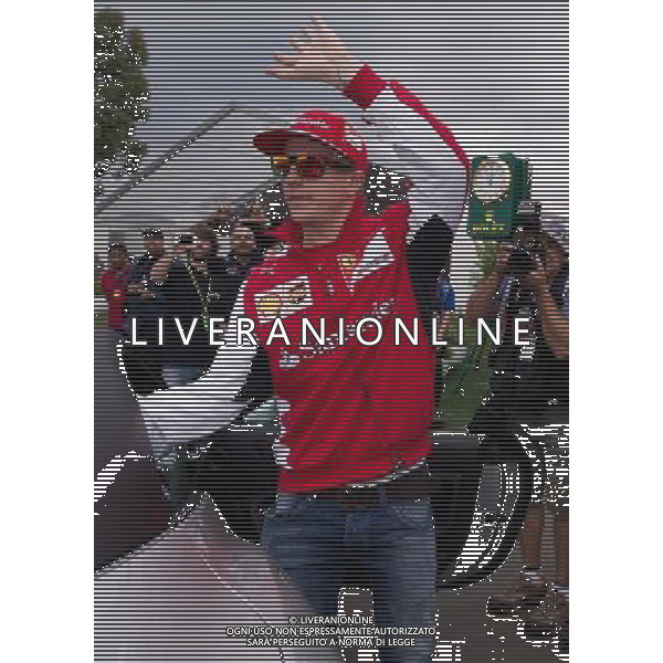 (140315) -- MELBOURNE, March 15, 2014 () -- Ferrari driver Kimi Raikkonen of Finland arrives ahead of the qualifying session for the Australian Formula One Grand Prix in Melbourne, Australia, March 15, 2014. (/Bai Xue) AG ALDO LIVERANI SAS ONLY ITALY