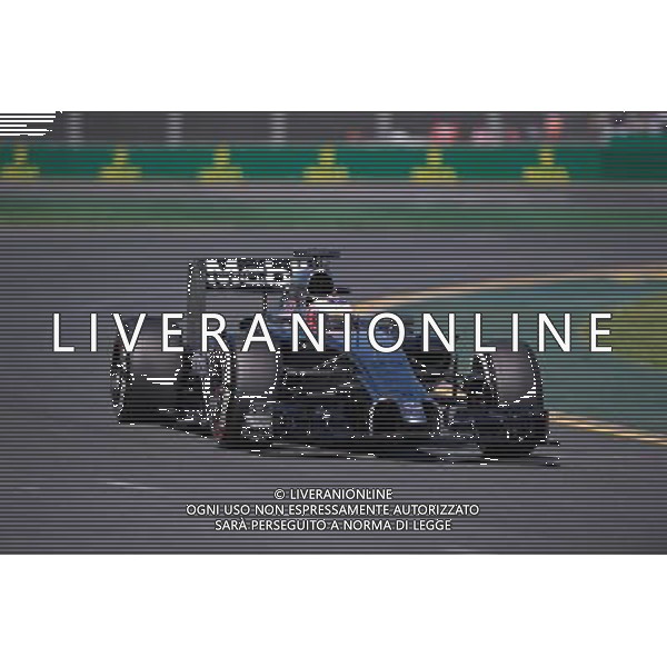 (140314) -- MELBOURNE, March 14, 2014 () -- McLaren Formula one driver Jenson Button of Great Britain drives during the first practice session of the Australian Formula One Grand Prix at Albert Park in Melbourne, Australia, March 14, 2014. (/Bai Xue) ©PHOTOSHOT/AGENZIA ALDO LIVERANI SAS - ITALY ONLY - EDITORIAL USE ONLY