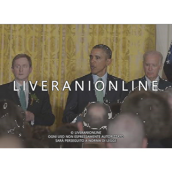 United States President Barack Obama hosts a St. Patrick\'s Day reception attended by Prime Minister Enda Kenny of Ireland in the East Room of the White House in Washington, D.C., USA, 14 March 2014. From left to right: Prime Minister Enda Kenny of Ireland, President Obama, and U.S. Vice President Joe Biden. AG ALDO LIVERANI SAS ONLY ITALY