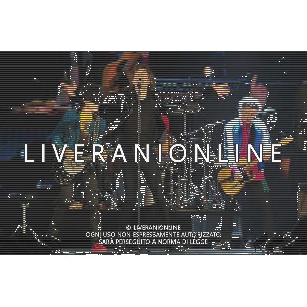 (140315) -- SINGAPORE, March 15, 2014 () -- The lead singer of British rock band The Rolling Stones Mick Jagger (front) performs with his band at Singapore\'s Marina Bay Sands Expo and Convention Centre, March 15, 2014. The Rolling Stones held a sole concert in Singapore on Saturday. (/Then Chih Wey)(zjl) AG ALDO LIVERANI SAS ONLY ITALY