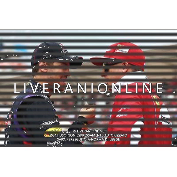 (L to R): Sebastian Vettel (GER) Red Bull Racing with Kimi Raikkonen (FIN) Ferrari on the drivers parade. 16.03.2014. Formula 1 World Championship, Rd 1, Australian Grand Prix, Albert Park, Melbourne, Australia, Race Day. - www.xpbimages.com, EMail: requests@xpbimages.com - copy of publication required for printed pictures. Every used picture is fee-liable. © Copyright: Batchelor / XPB Images AG ALDO LIVERANI SAS ONLY ITALY