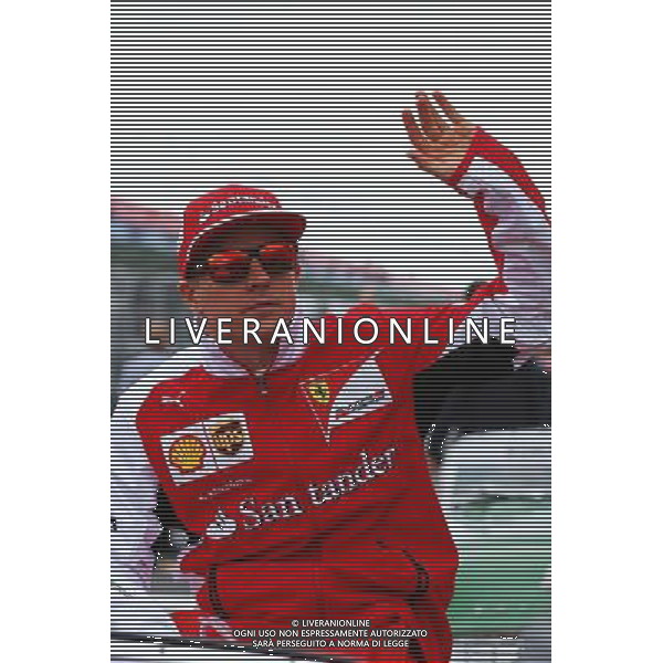 Kimi Raikkonen (FIN) Ferrari on the drivers parade. 16.03.2014. Formula 1 World Championship, Rd 1, Australian Grand Prix, Albert Park, Melbourne, Australia, Race Day. - www.xpbimages.com, EMail: requests@xpbimages.com - copy of publication required for printed pictures. Every used picture is fee-liable. © Copyright: Batchelor / XPB Images AG ALDO LIVERANI SAS ONLY ITALY