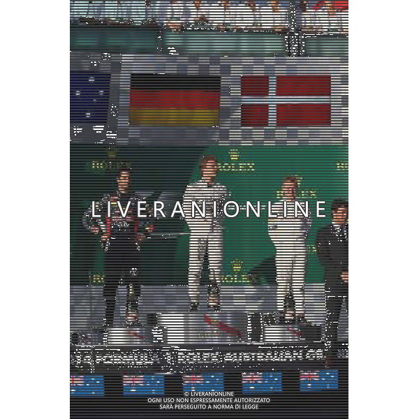 1st place Nico Rosberg (GER) Mercedes AMG F1 W05, 2nd place Daniel Ricciardo (AUS) Red Bull Racing RB10 and 3rd place Kevin Magnussen (DEN) McLaren MP4-29. 16.03.2014. Formula 1 World Championship, Rd 1, Australian Grand Prix, Albert Park, Melbourne, Australia, Race Day. - www.xpbimages.com, EMail: requests@xpbimages.com - copy of publication required for printed pictures. Every used picture is fee-liable. © Copyright: Batchelor / XPB Images AG ALDO LIVERANI SAS ONLY ITALY