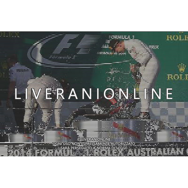1st place Nico Rosberg (GER) Mercedes AMG F1 W05, 2nd place Daniel Ricciardo (AUS) Red Bull Racing RB10 and 3rd place Kevin Magnussen (DEN) McLaren MP4-29. 16.03.2014. Formula 1 World Championship, Rd 1, Australian Grand Prix, Albert Park, Melbourne, Australia, Race Day. - www.xpbimages.com, EMail: requests@xpbimages.com - copy of publication required for printed pictures. Every used picture is fee-liable. © Copyright: Batchelor / XPB Images AG ALDO LIVERANI SAS ONLY ITALY