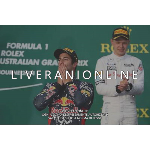 Daniel Ricciardo (AUS) Red Bull Racing RB10 and Kevin Magnussen (DEN) McLaren MP4-29. 16.03.2014. Formula 1 World Championship, Rd 1, Australian Grand Prix, Albert Park, Melbourne, Australia, Race Day. - www.xpbimages.com, EMail: requests@xpbimages.com - copy of publication required for printed pictures. Every used picture is fee-liable. © Copyright: Batchelor / XPB Images AG ALDO LIVERANI SAS ONLY ITALY