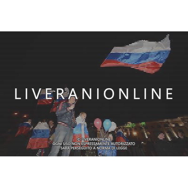 (140316) -- SIMFEROPOL, March 16, 2014 () -- Crimeans holding russian flags celebrate in front of the parliament building in Simferopol, capital of Ukraine\'s Autonomous Republic of Crimea, March 16, 2014. Although the 2014 Crimea referendum was still in process and results might take hours of processing before coming out, Crimeans in the capital city of the peninsula were already seen streaming toward the central city square for celebration. Local television quoted late Sunday an exit poll by the Crimean Republic Institute for Political and Social Studies as saying that 93 percent of voters in the Autonomous Republic of Crimea were in favor of reunification with Russia. (/Sadat) AG ALDO LIVERANI SAS ONLY ITALY