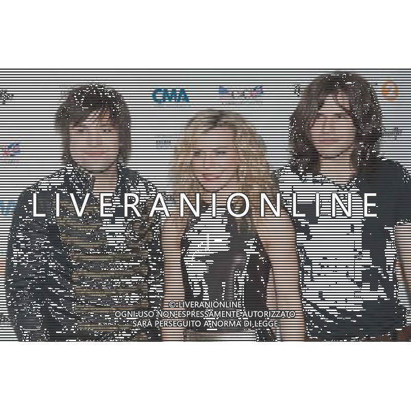 (L to R) Neil, Kimberly and Reid Perry of The Band Perry at the Country to Country (C2C) Music Festival at the O2 Arena on Sunday 16th March 2014, London, England, UK. AG ALDO LIVERANI SAS ONLY ITALY