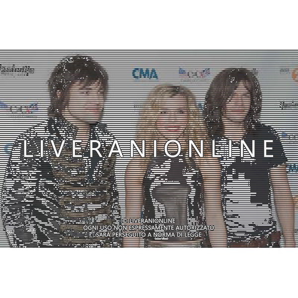 (L to R) Neil, Kimberly and Reid Perry of The Band Perry at the Country to Country (C2C) Music Festival at the O2 Arena on Sunday 16th March 2014, London, England, UK. AG ALDO LIVERANI SAS ONLY ITALY