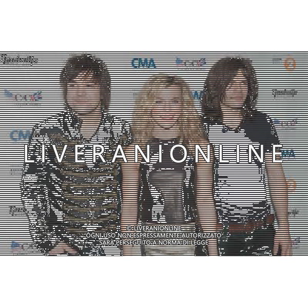 (L to R) Neil, Kimberly and Reid Perry of The Band Perry at the Country to Country (C2C) Music Festival at the O2 Arena on Sunday 16th March 2014, London, England, UK. AG ALDO LIVERANI SAS ONLY ITALY