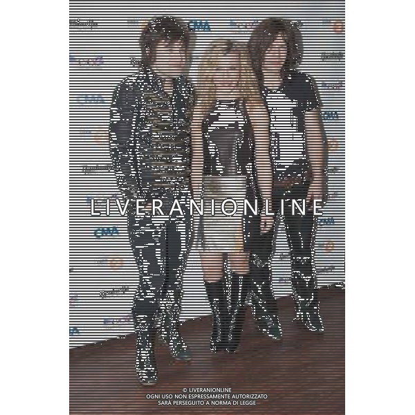(L to R) Neil, Kimberly and Reid Perry of The Band Perry at the Country to Country (C2C) Music Festival at the O2 Arena on Sunday 16th March 2014, London, England, UK. AG ALDO LIVERANI SAS ONLY ITALY