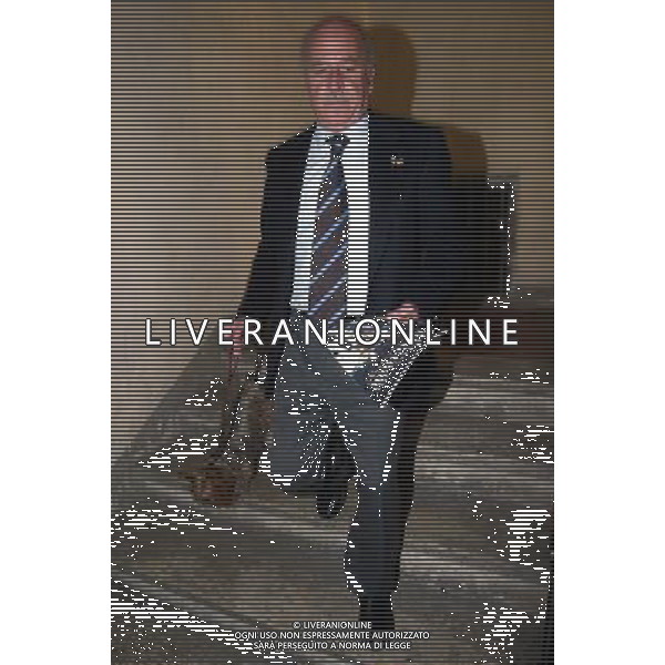 Servizio Presidente A.C.Siena Paolo De Luca Il Presidente scende le scale della sede dell\'A.C. Siena con in mano il giornale della societˆ e al guinzaglio il cagnolino Douss foto aldo liverani de luca paolo
