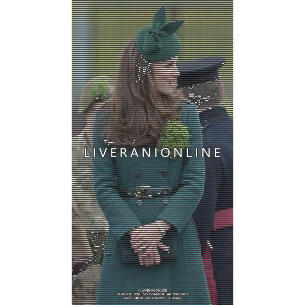 The Duke and Duchess of Cambridge visit the 1st Battalion Irish Guards at the St. Patrick\'s Day Parade at Mons Barracks, Aldershot, Hampshire.The Duke of Cambridge attended the Parade as Colonel of the Regiment. The Duchess of Cambridge presented the traditional sprigs of shamrocks to the Officers and Guardsmen of the Regiment. 17.3.14 ©PHOTOSHOT/AGENZIA ALDO LIVERANI SAS - ITALY ONLY - REALI INGLESI: Il Principe William e Kate Middleton Duchessa di Cambridge visitano il 1mo Battaglione delle Guardie Irlandesi presso il St. Patricks Day Parade a Mons Barracks Aldershot 17 Marzo, 2014